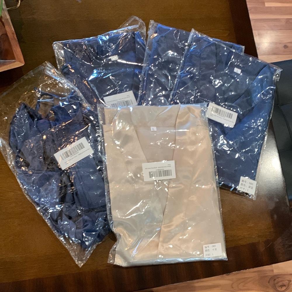 4 navy blue robes and 1 ivory robe